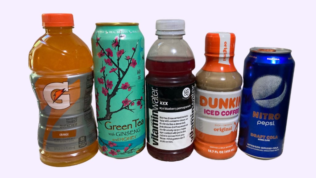 Picture of 5 drinks side by side: Gatorade Orange, Arizona Green Tea, Vitamin Water XXX, Dunkin' Iced Coffee, Pepsi Nitro